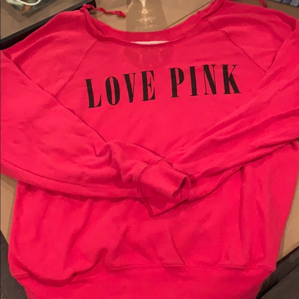 pink VS sweater. Off shoulder cut neck.